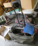 shop bag  on casters with welding helmet torch hose