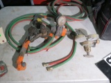 new torch hose, gauges, hoses, and cutting torch in case