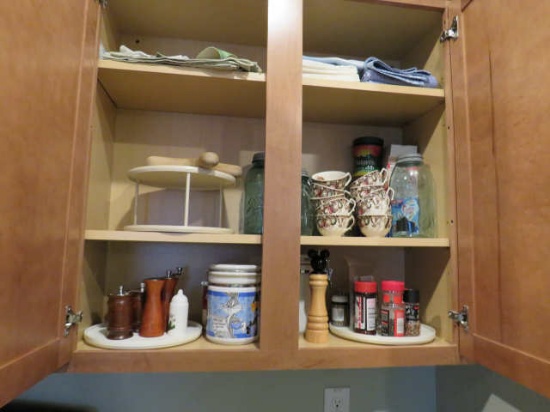 mixed cups, spices, misc items in kitchen cabinet