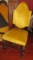 ornate dining chairs with yellow velvet upholstery