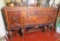 ornate walnut finished buffet with 2 drawers and 2 side doors 40” high x66” long x 22” deep