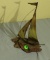 metal sailboat on wood base 9” high x 6” long x 3”