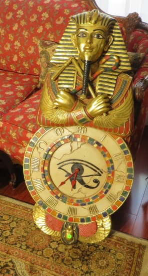 King Tut clock with gold leaf finish acrylic with battery powered clock mechanism 38” high x 19” wid