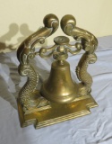 brass bell oriental shape with fish on sides 12” high x 10” long x 4” deep
