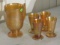 carnival glass pitcher and 4 glasses