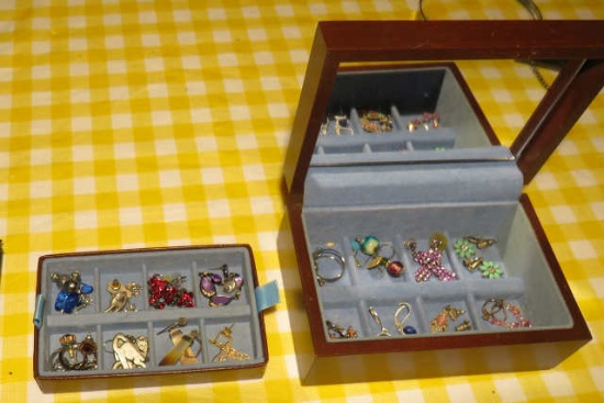 small  earring box with 15 assorted pair of earrings.  Box measures 6" x 4" x 2.5"