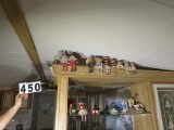 collection of 15 sitting doll figures
