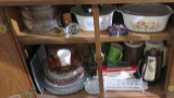 Corningware and mixed glass in lower china cabinet