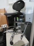 Hydraulic chair goes from desk height to school height, black with chrome base