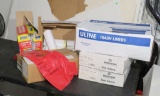 assorted boxes of can liners and box hasmat bags