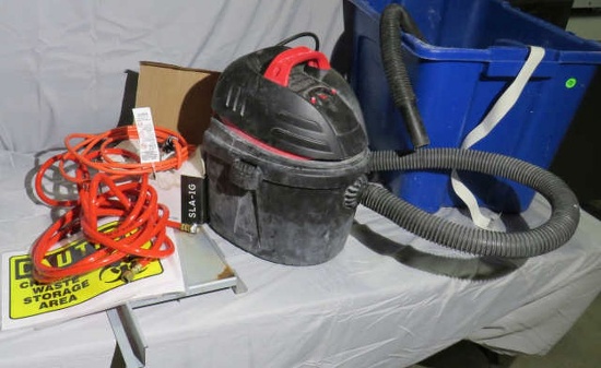 2 1/2 gal shop vac, 25' air hose and mixed small extension cords with a tote