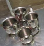 Winco Stainless Steel (3) 5 oz. pitchers and (1) 3 oz pitcher