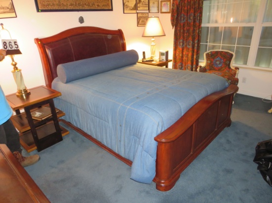 sleigh style queen bed with bedding headboard and footboard in dark maple