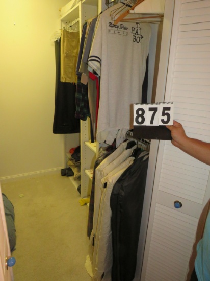 clothing in bedroom closet includes mens suits, shirts, sports wear, cowboy boots, shoes, pants, rob