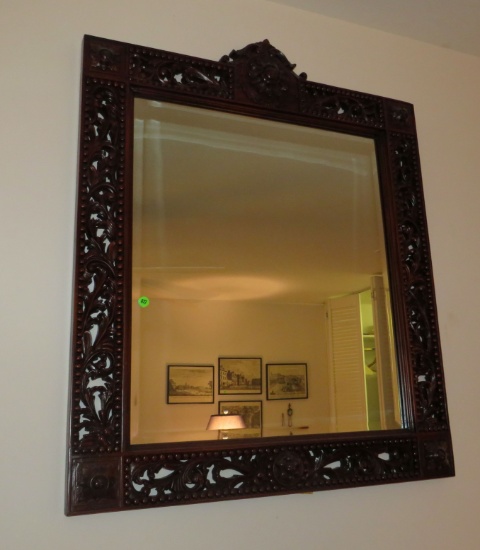 ornately framed beveld glass mirror 38”H x 31”W.
