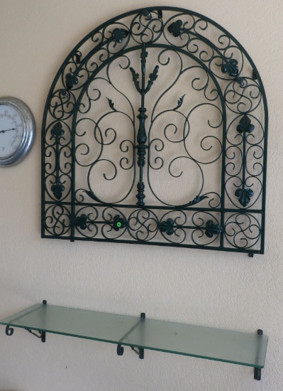 decorative wrought iron arch and thermometer gauge