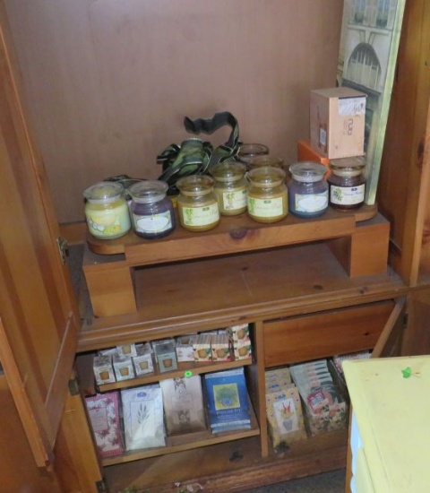 Assorted Votive Candles and Fragrant Sachets (in Pine Entertainment Center)