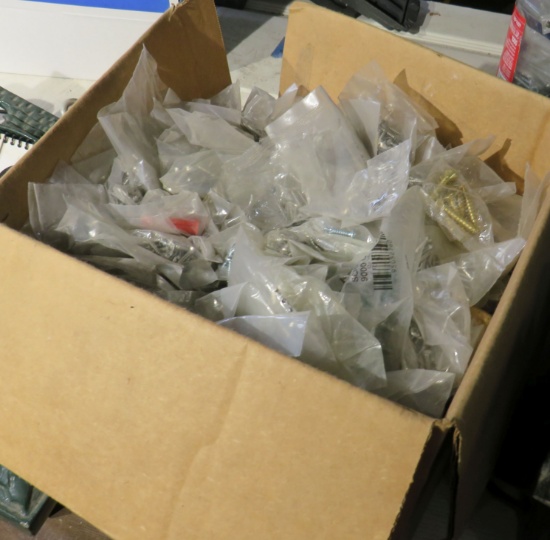 25 lbs. of assorted hinge screws in small packages