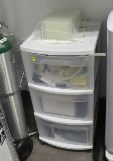 3 drawer plastic cabinet with mixed lab supplies
