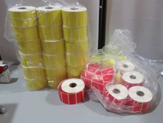 box of 28 rolls of  red and yellow 1" x 2" labels