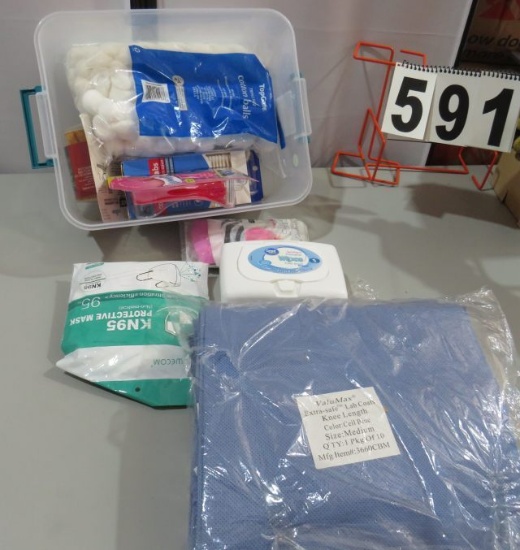 box cotton balls, swabs, masks, and 7 new disposable blue lab coats