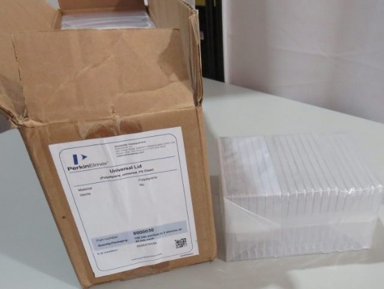 box of 100 Perkins Elmer universal lids #6000030 sealed in plastic