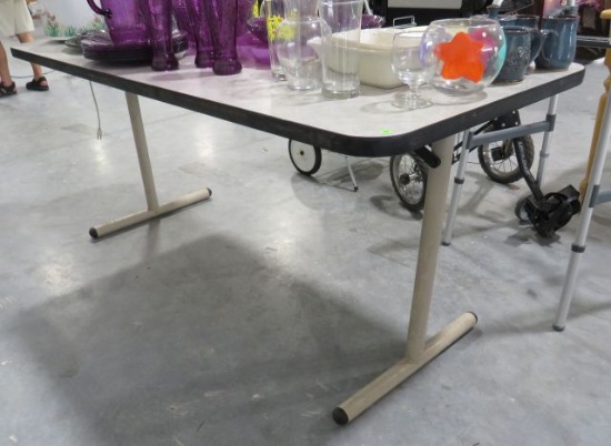 folding table 29" x 64" x 29" high (contents not included)