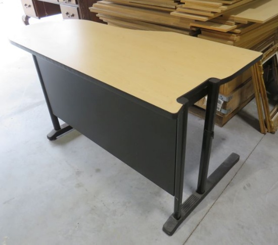 blond computer desk with black legs