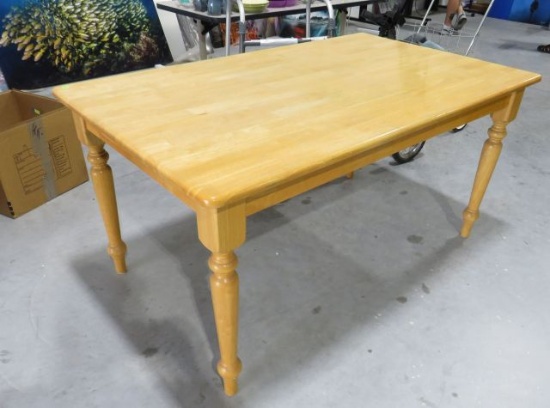 blond oak finish dining table 29n" x 64" x 29"  high (contents not included)