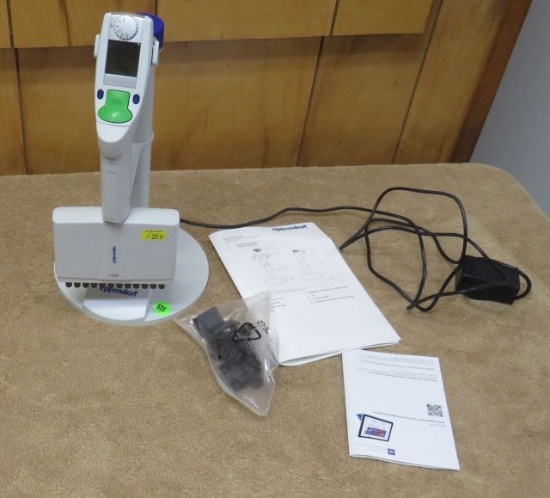 Eppendorf charging stand with 1200 multi channel pipette