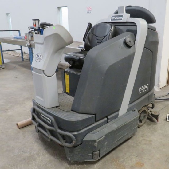 Ecoflex SC6000 floor scrubber and water vacuum 899 hours on meter, working order