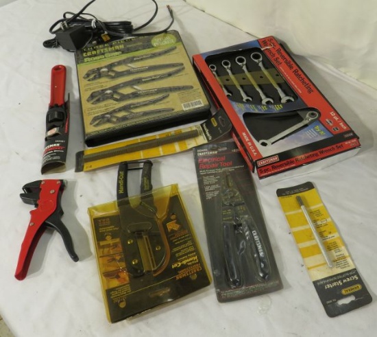 mixed new tools in original boxes including Craftsman wrenches and clamp plyers