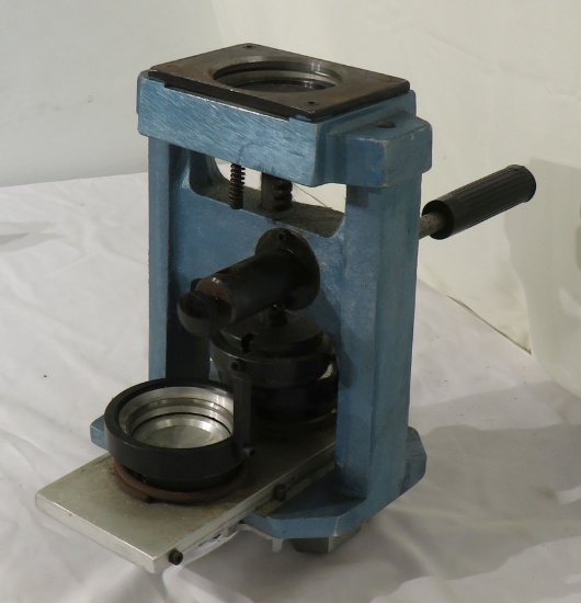 Instant button press machine with operating instructions (bar type handle missing)