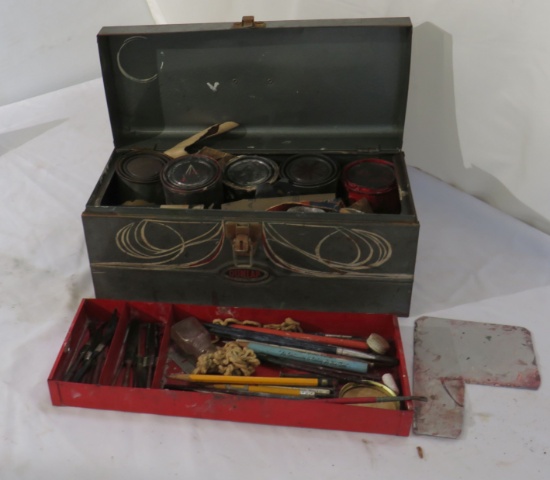 artist metal tool box with supplies