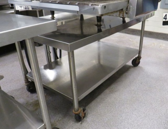 stainless steel table on casters 60" x 36" x 31" high (under lot 488 stack pizza oven)
