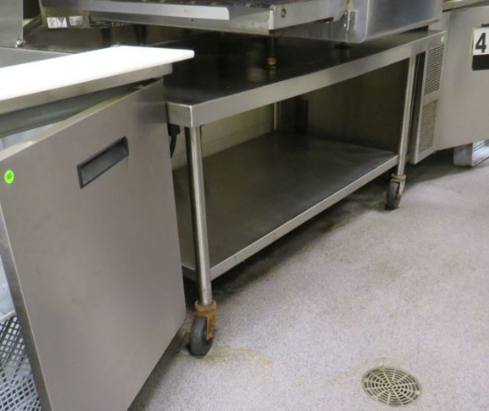 stainless steel table on casters 60" x 36" x 31" high (under lot 487 stack pizza oven)