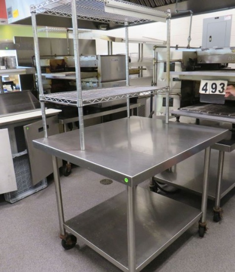 stainless steel table on casters 36" x 42" x 36" table top with metro style 2 wire shelf 18" d x 36"