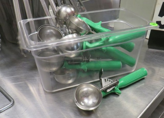 green handle ice cream scoops with plastic salad container