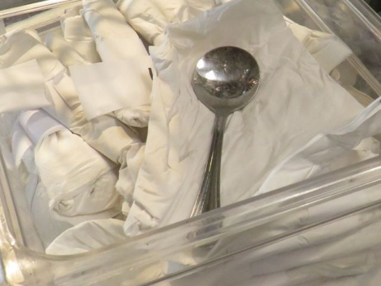 soup spoon setup in plastic container