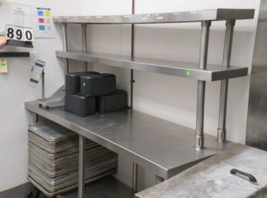 stainless steel table on casters with under shelf and two over shelves 72" x 24" (two top shelves ar