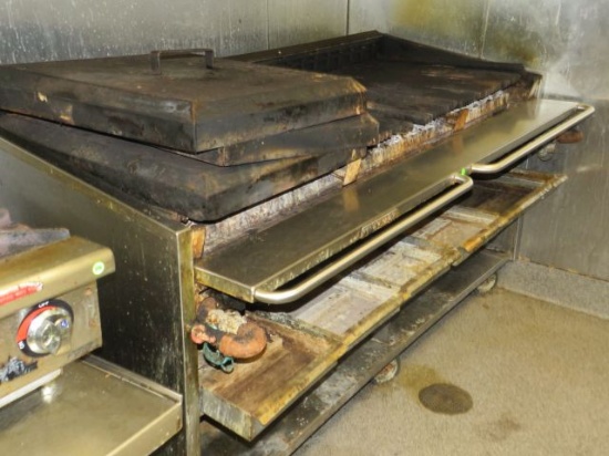 MagiKitch'n 16 burner gas grill on casters
