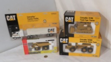 Cat ERTL die cast toy (1) tractor trailer (1) articulated dump truck, (1) compact dump truck, (1)...