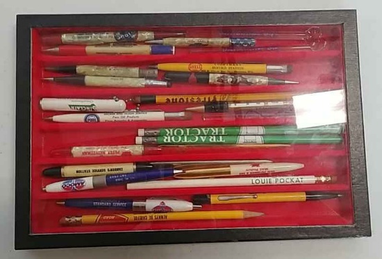 Advertising pens & pencils in display case
