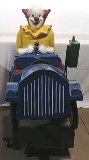 Coin operated clown ride