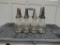 8 glass oil bottles w/ spouts & wire case