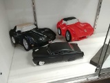 3-D wall plaques and tin car