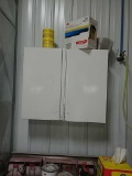 Wall white cabinet with contents