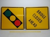 SSA.street signs,light ahead/bridge closed