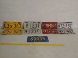 Assorted vintage license plates