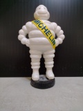 Michelin Man standing on tire. cast